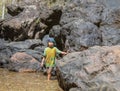 The boys were playing on the rocks and enjoy the Chok Kra-DinÃÂ WaterFalls